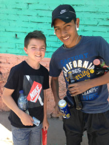white teen boy with mexican teen boy